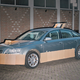 Illustration for article titled This Artist Turns Boring Rides Into Supercars At Night Using Cardboard